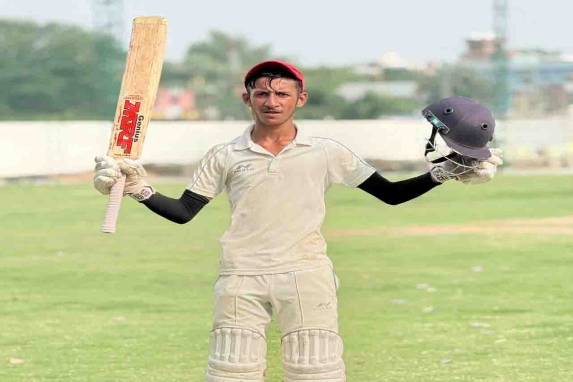 Akshit Singh Tomar celebrates his unbeaten 195-run knock for Pioneer CC in the Patna Junior Division Cricket League 2025 match.